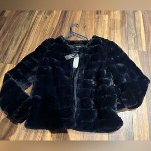 NET size medium faux fur jacket.